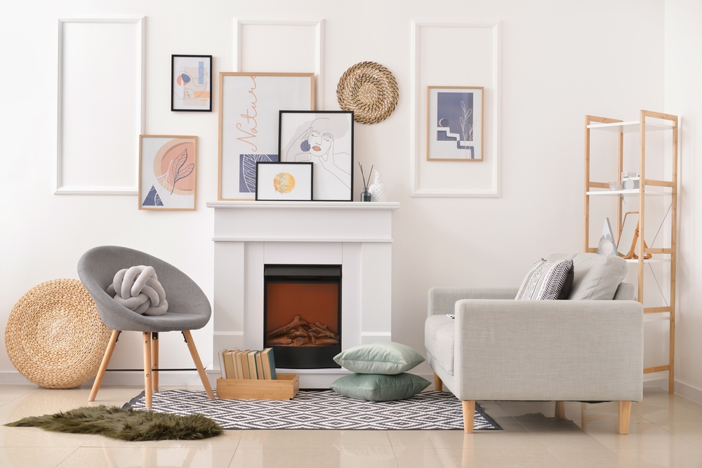 Living Room With Fireplace And Leaning Artwork